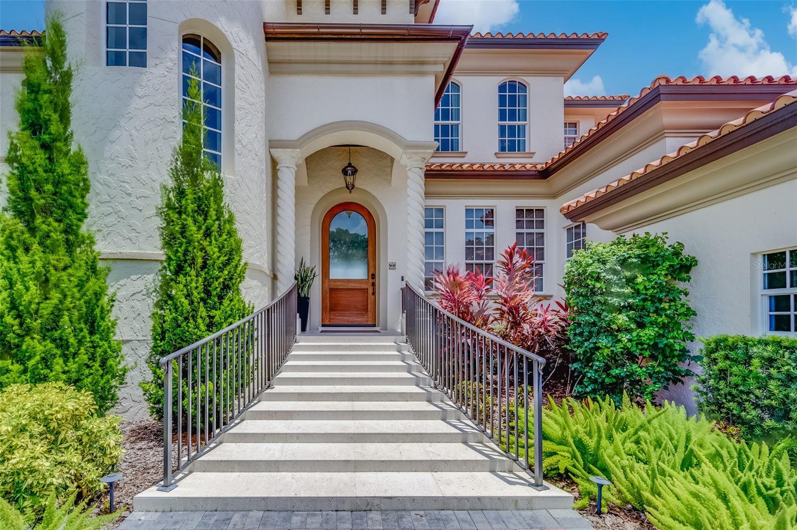 Exquisite Coastal Waterfront Luxury Home on St. Pete Beach
Indulge in the epitome of refined coastal living with this spectacular waterfront 4-bedroom, 4-bathroom pool residence, located in one of the most coveted enclaves of St. Pete Beach. Offering over 4,475 square feet of unparalleled elegance, this 2007-built masterpiece has been meticulously designed to ensure comfort, security, and opulence at every turn.
This property boasts a wealth of recent upgrades that enhance both functionality and luxury. Equipped with a state-of-the-art Luma View Security System, your peace of mind is always assured. The residence remains in pristine condition, having withstood both recent hurricanes without sustaining any water damage, a testament to its solid construction and thoughtful design.
Upon entry, you're greeted by a stunning chef’s kitchen that redefines culinary excellence. Featuring custom cabinetry, a professional-grade gas range, a sprawling walk-in pantry, and quartz countertops, it’s a space meant for creating unforgettable meals. A spacious island serves as the heart of the kitchen, perfect for gatherings and casual dining. For those who enjoy entertaining, the adjacent wet bar, complete with a wine fridge, is ideal for hosting guests in style.
The home’s expansive layout is bathed in natural light, thanks to the large hurricane impact windows throughout, providing both safety and beauty. A sweeping staircase leads you to the second floor, where newly installed hardwood floors add an element of warmth and sophistication. Custom drapery and window treatments complement the space, further elevating the home’s luxurious feel.
The newly remodeled media room is an entertainer's dream, featuring a built-in bar and ample space for watching movies or relaxing with friends. Whether it's a cozy movie night or an elegant cocktail party, this room effortlessly sets the tone for any occasion.
Step outside into your own private paradise. The backyard is a tropical oasis designed for ultimate relaxation and enjoyment. Take a refreshing dip in the saltwater pool, surrounded by lush, newly landscaped gardens. A new pool pump installed in February, ensures that every element of this home is in impeccable condition.
For boating enthusiasts, the 63 feet of pristine waterfrontage is complemented by a new sea wall, a 2021 Trex dock, and a 30,000lb boat lift (installed in 2022), offering easy access to the open water. Whether you're an avid boater or simply love watching the marine life play from your dock, this residence is the perfect place to do both.
This coastal gem also features a water treatment system that softens and filters the water throughout the entire home, ensuring every drop is pure and perfect. With a 2-car garage and an array of high-end amenities, including a top of the line washer and dryer, Control 4 Audio-Visual System, and all TVs, no detail has been overlooked.
Located just minutes from the pristine sands of St. Pete Beach, this property offers the ideal blend of luxury, privacy, and coastal charm. A true sanctuary, this home is waiting to become your own personal retreat.