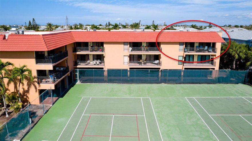 Enjoy Coastal Living on Anna Maria Island !  This 2 bedroom, 2 bath, 2nd floor, turnkey furnished condo is located in one of the best & most sought after complexes on the Island.  Heated swimming pool, spa, pickleball/tennis courts, shuffleboard court, building elevator & beach are just a few of the condo amenities.  The condo overlooks the tennis courts with updated stylish kitchen, quartz countertop, stainless appliances & an open/airy floor plan.  Large lanai, crown molding throughout & all tile floors accent this gorgeous condo.  Washer & dryer are located inside the unit, plus there is an owner's storage room on the ground level. Kitchen appliances & A/C system new in 2021.  Just walk across the street to enjoy the white sandy beach & blue green waters of the Gulf of Mexico.  Enjoy living the Florida lifestyle!