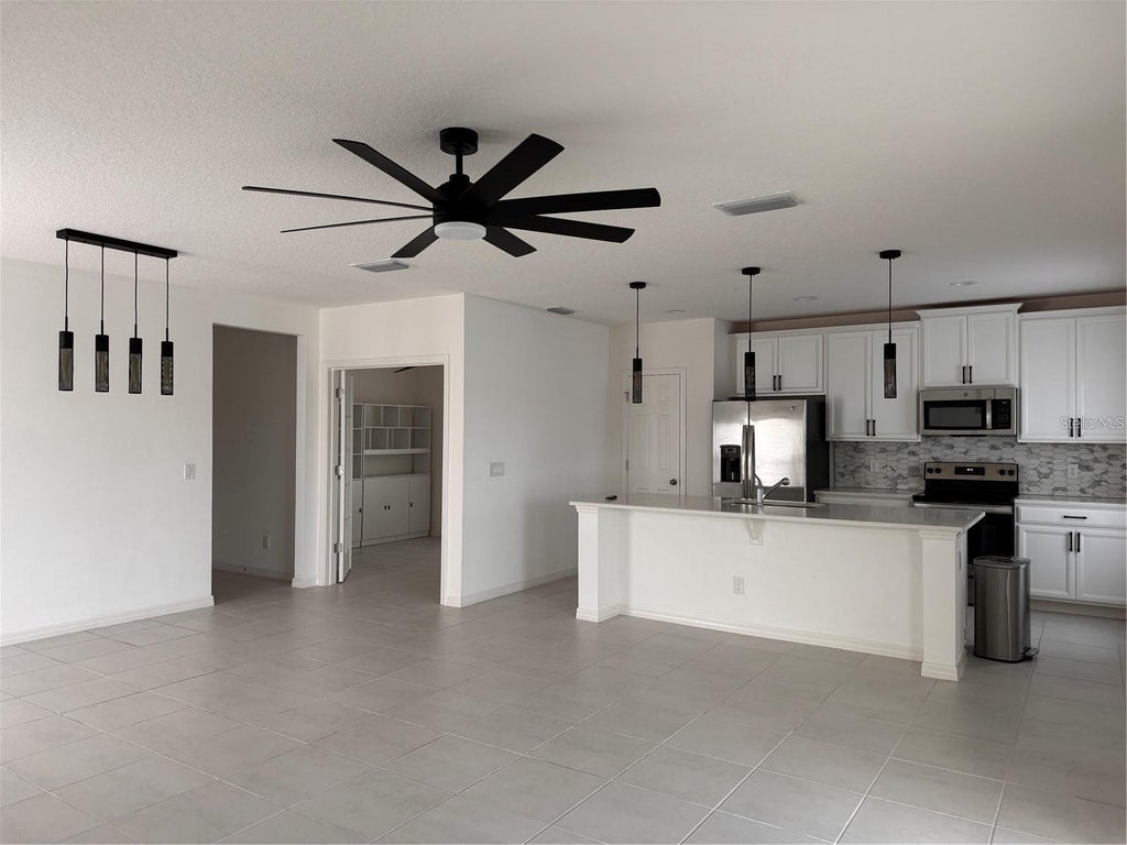 Photo of 862 Marcel Loop, Davenport, FL 33837 (MLS # S5157259)