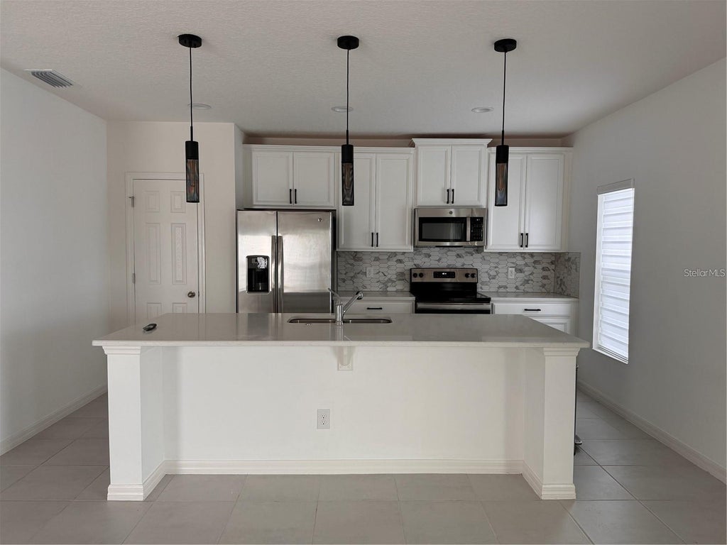 Photo of 862 Marcel Loop, Davenport, FL 33837 (MLS # S5157259)