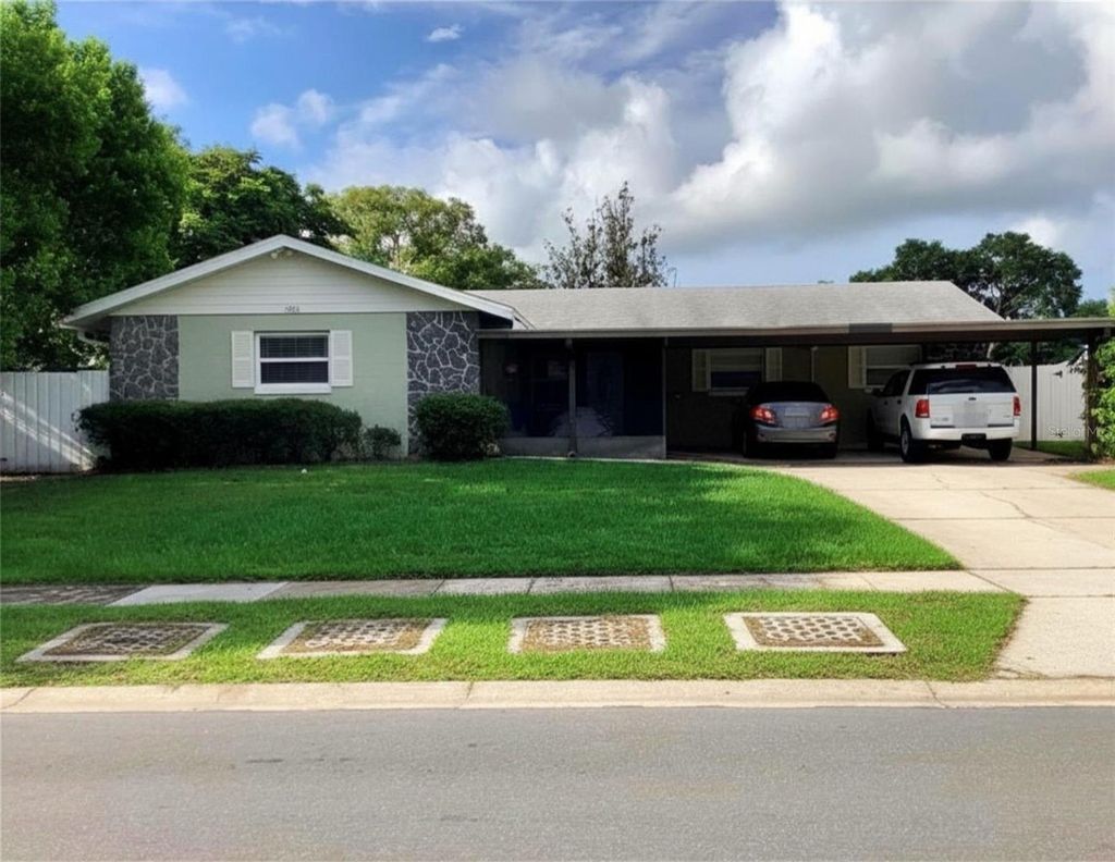 Photo of 10618 Eastview Drive, Orlando, FL 32825 (MLS # O6404924)