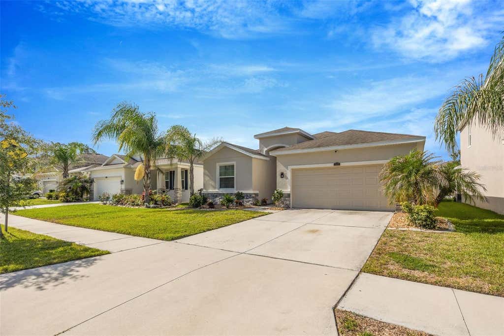 Photo of 32876 Sand Creek Drive, Wesley Chapel, FL 33543 (MLS # TB8519264)