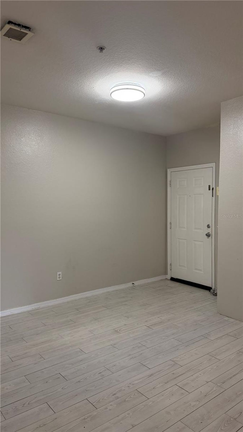 Photo of 2651 Maitland Crossing Way #102, Orlando, FL 32810 (MLS # O6396839)