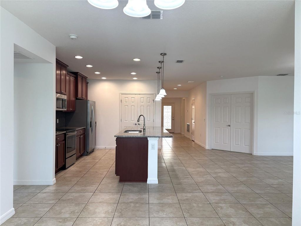 Photo of 1404 Lanier Point Place, Kissimmee, FL 34746 (MLS # O6409883)
