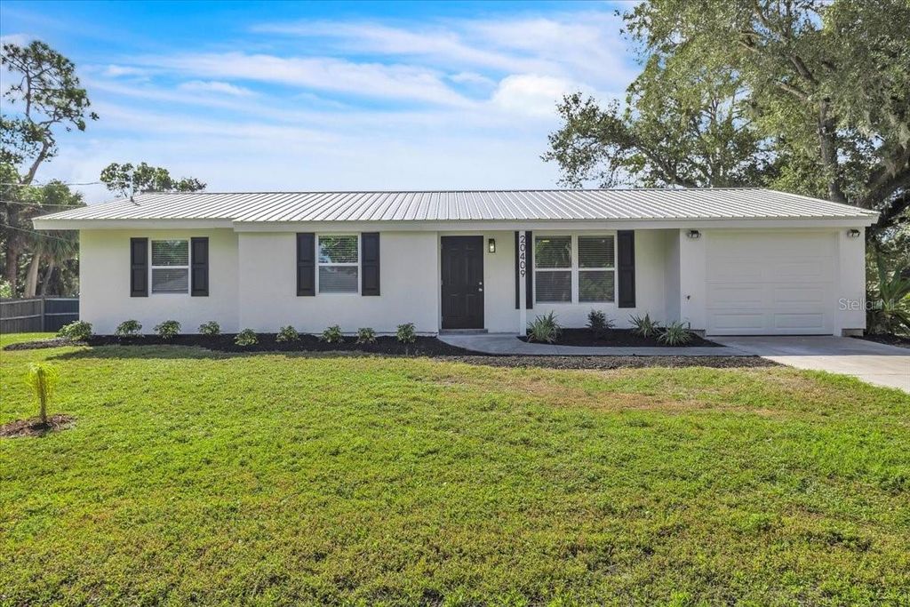 Photo of 20409 Emerald Avenue, Port Charlotte, FL 33952 (MLS # C7516821)