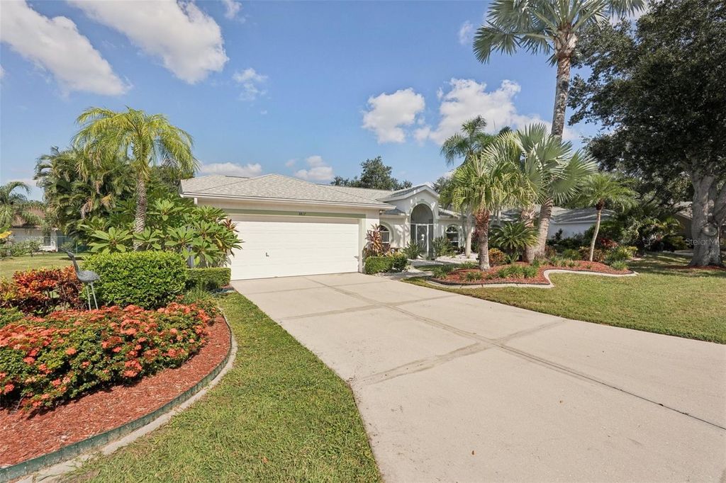 Photo of 3817 Garden Lakes Estates Drive, Bradenton, FL 34203 (MLS # A4674450)