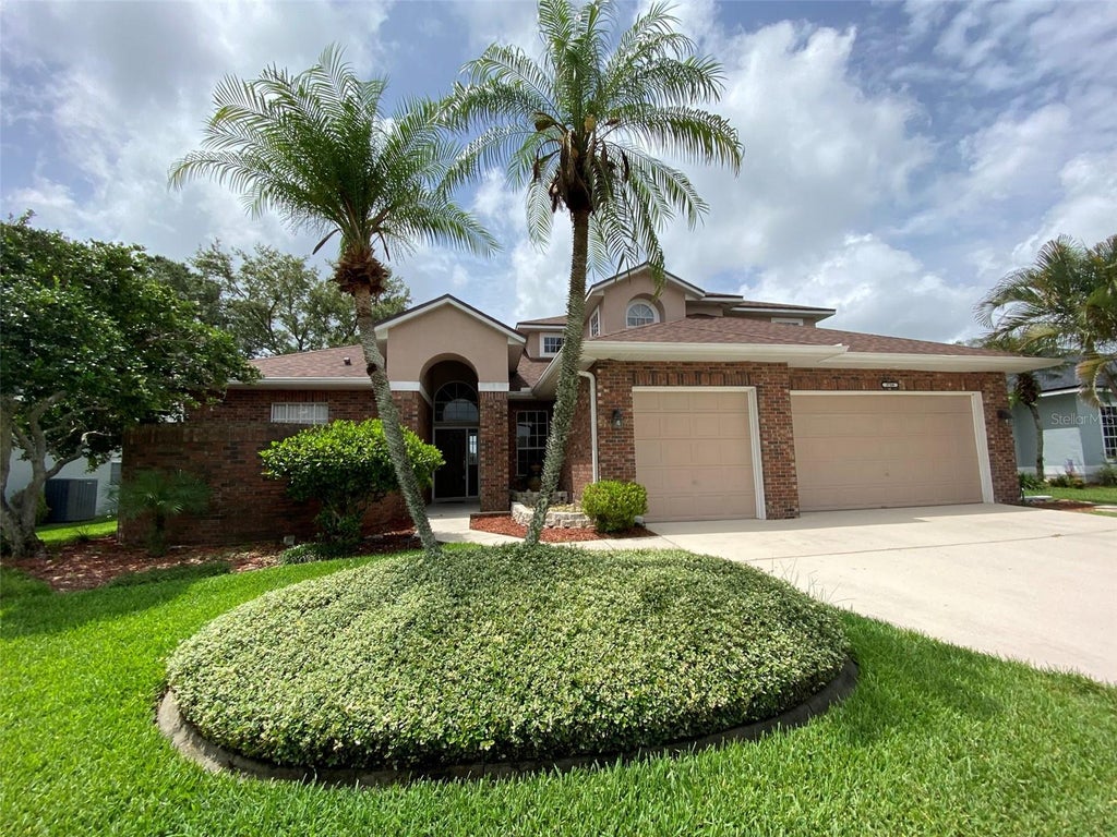 Photo of 3708 Molona Drive, Orlando, FL 32837 (MLS # O6426381)