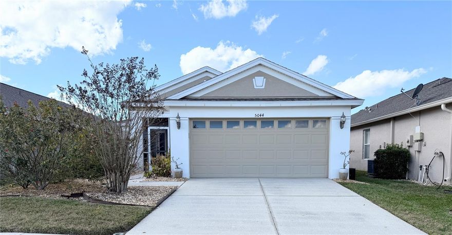 ***MAINTENANCE FREE LIVING AT ITS FINEST IN A GATED VILLAGE OF THE HIGLY DESIRABLE LEXINGTON OAKS GOLF COMMUNITY***. This Move-in-Ready Home features Beautiful laminate flooring throughout most of the home (NO CARPET!), a SPLIT and OPEN floor plan, excellent for entertaining. Entering through the ample foyer, you will find a flex room that can be utilized as an Office or a 3rd bedroom. The kitchen with eat-in area offers a Breakfast Bar, a closet Pantry, solid wood cabinets, and stainless-steel appliances. The great room has ample room with high ceilings, ideal for relaxing or entertaining. The master suite showcases an attractive ensuite bathroom with walk-in shower, large walk-in closet, and dual sinks. Relax in the serene air-conditioned Florida Room with views of beautiful landscaping. Adorned with tree-lined streets and perfectly manicured lawns, this is a maintenance-free subdivision offering LAWN MAINTENANCE and Trash Pickup. Enjoy the amenities that Lexington Oaks has to offer, including Clubhouse, Tennis, Fitness Center, Resort-Style HEATED Pool, Splash pads, Playground, Basket-ball Court, Beach Volleyball, Soccer field, and miles of Trails. You can also choose to join the country club and enjoy the 18-hole golf course and the Omari Bar & Grill. Conveniently located Shopping, Restaurants, grocery, and convenient to I-75/I-275, The Grove, Premium Outlets, Shops at Wiregrass, Advent Health Hospital, Baycare hospital, Pasco-Hernando State College, Center Ice and much more. Call now to schedule your private tour and make it your new Home before it's gone!