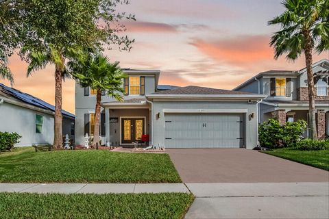 Photo of 12015 Stone Bark Trail, Orlando, FL 32824 (MLS # TB8447181)