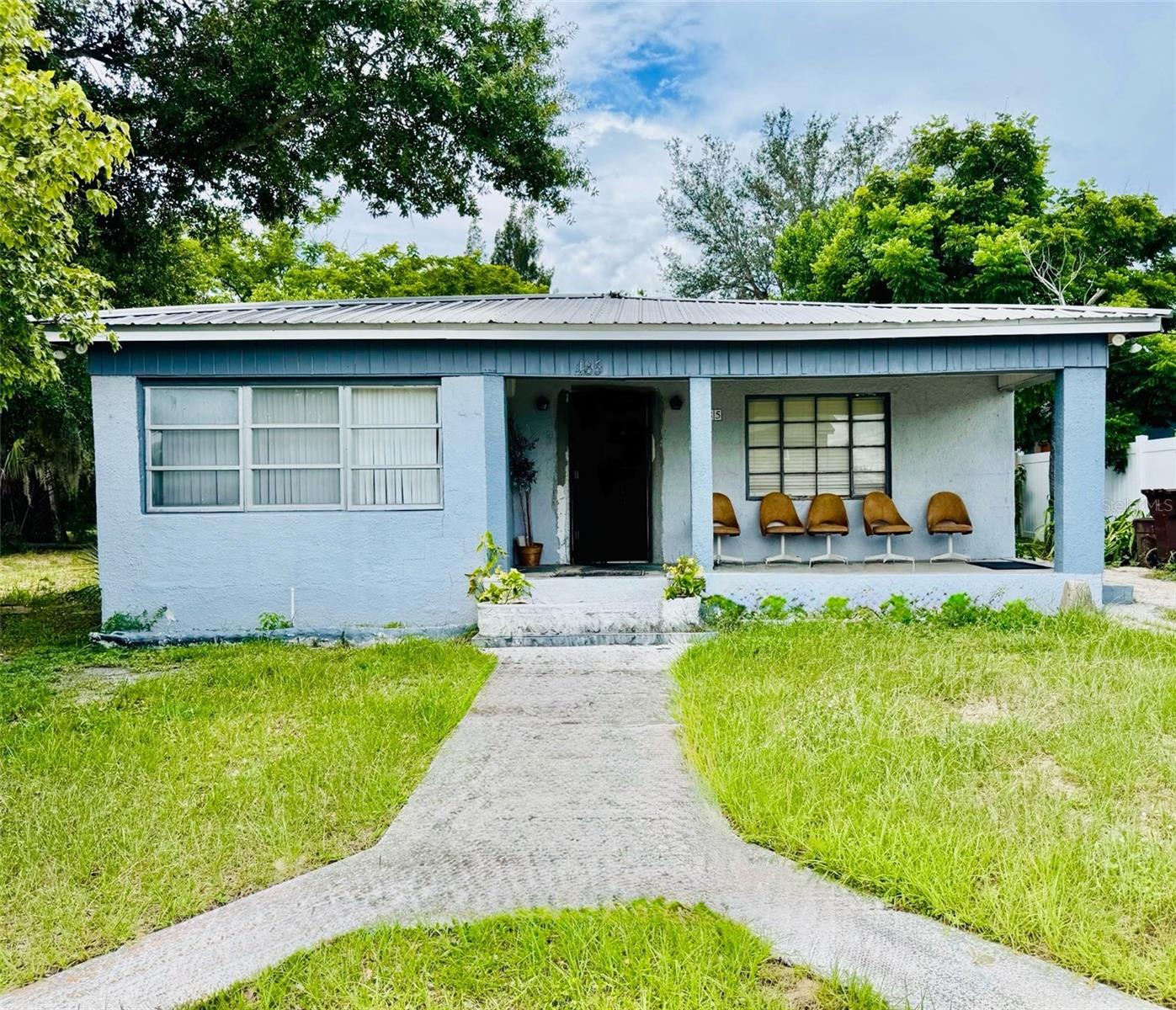 Situated directly across from Janie Howard Wilson Elementary, this concrete block property presents an exceptional investment opportunity with significant income potential. Offering 10 bedrooms, 2 bathrooms, 2 kitchens, and an office space, the layout is ideal for generating strong cash flow through rental income with multi-tenant, single bedroom leasing. The property features an 8 year old metal roof, several replaced windows, and the bedrooms that have been updated over the years. In addition, there is storage space at the back of the property that used to be a store front, but could be converted into rentable storage units or additional rooms to maximize returns. Much of the heavy lifting has already been done, and with targeted improvements, this property has the ability to become a high-performing income-producing asset. Call today to schedule a walk-through and explore the possibilities.
