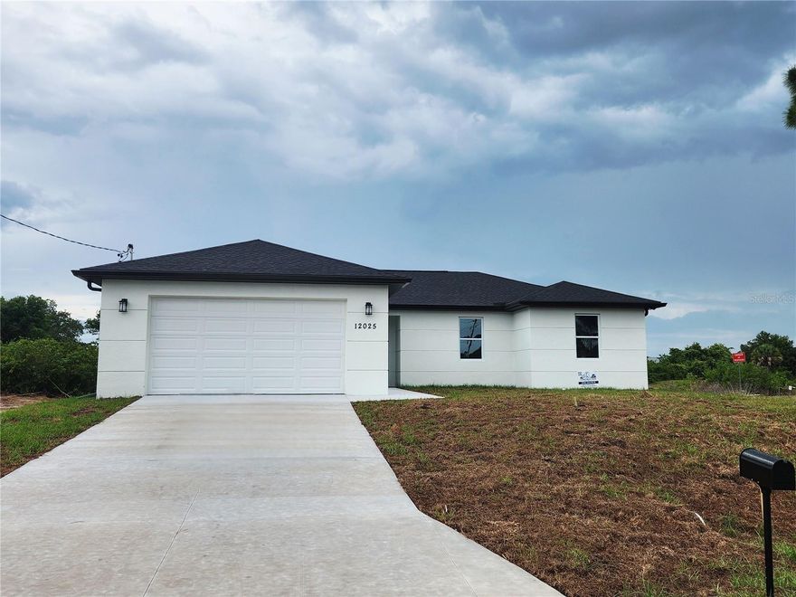 Experience the best of Florida living in this brand-new 2026 construction home located in the highly desirable area of Port Charlotte. Situated on an oversized corner lot offers room for a future pool and outdoor entertainment area with peaceful freshwater canal views, the perfect blend of privacy, nature, and modern comfort. Peaceful canal setting ideal for remote work, retirement, or year-round Florida living. Flexible 4-bedroom layout provides space for guests, extended family, or a dedicated home office. Property with open-concept design, ceramic tile throughout, stone countertops, stainless steel appliance package, high ceilings, and walk-in closet in primary suite. Surrounded by new construction homes in a rapidly developing of Port Charlotte. Enjoy relaxing evenings overlooking the canal, where local residents often fish and gather while enjoying refreshing breezes and stunning Florida sunsets. One of the most attractive features of this property is its location in a Flood Zone X, providing added peace of mind. Enjoy the freedom of homeownership without HOA restrictions and NO CDD fees, allowing homeowners greater flexibility and lower ownership costs. Conveniently located within minutes of shopping centers, restaurants, grocery stores, schools, medical facilities, and daily conveniences. World-renowned Gulf Coast destinations including Boca Grande, Englewood Beach, and multiple marinas are just a short drive away. Whether you're looking for a primary residence, seasonal retreat, or long-term investment in an area experiencing continued growth and appreciation, this property presents an outstanding opportunity. All financing welcome!