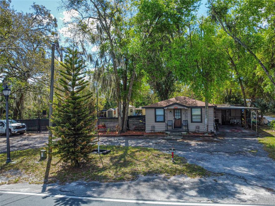 Welcome to 82 Concord Drive in Castleberry, Florida—a rare opportunity offering charm, space, and exceptional investment potential. Situated on a generous 0.36-acre fully fenced lot, this 2-bedroom, 1.5-bath home provides both privacy and flexibility in a highly desirable location.

Inside, the home features a cozy and inviting layout, perfect for comfortable living or a potential office space. Outside, the expansive lot and large parking area gives ample room for vehicles, equipment, boats, or trailers—ideal for both personal and business use.

What truly sets this property apart is its dual zoning for residential and commercial use, opening the door to a wide range of possibilities. Investors and business owners will appreciate the flexibility this property offers, including potential uses such as a warehouse, mechanic shop, contractor yard, storage for recreational vehicles or “toys,” or a live/work setup.

Additionally, the sizable lot presents future development opportunities, with potential for duplexes or multifamily configurations (buyer to verify zoning and land use). Whether you’re looking to operate a business, generate rental income, or redevelop, this property provides a versatile foundation to bring your vision to life.

Opportunities with this level of flexibility are hard to find—schedule your private showing today and explore the full potential of this unique property!