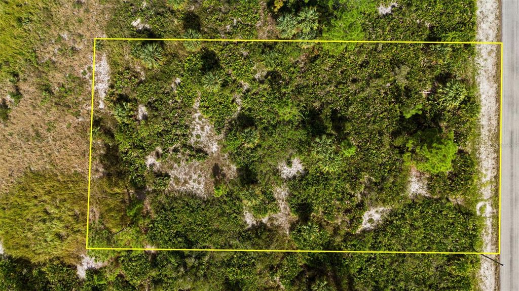 Photo of 1217 Magnolia Avenue, Lehigh Acres, FL 33972 (MLS # TB8320592)