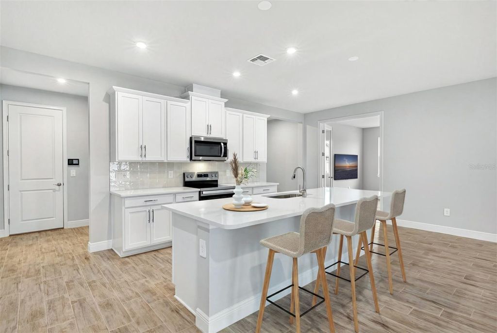 Photo of 18448 Vista Park Terrace, Venice, FL 34293 (MLS # TB8474893)