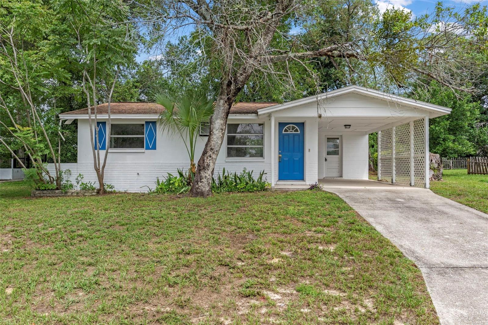 Adorable and fully renovated 1 bedroom, 1 bathroom cottage home offering 675 sq ft of cozy living space. This charming home features luxury vinyl plank (LVP) flooring throughout, freshly painted inside and out, a functional galley kitchen, dedicated dining area, and an open floor plan that maximizes comfort and flow. Enjoy the convenience of a carport, a spacious laundry room, and a private wooded backyard perfect for relaxing or entertaining. Roof 2020. Ideally located just minutes from restaurants, shopping, and only 20 minute from the natural waterways and beauty of Crystal River. A perfect blend of character and modern updates- don't miss the unique gem!