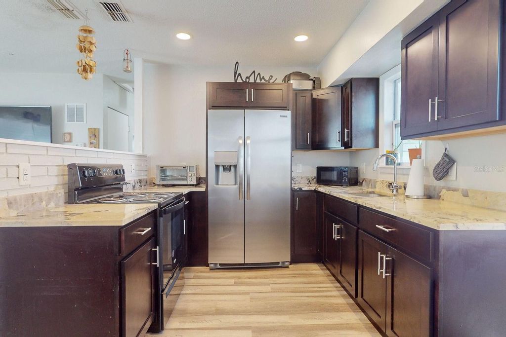 Photo of 827 26th Avenue S, St Petersburg, FL 33705 (MLS # TB8436557)