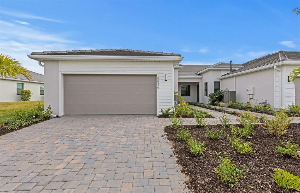 Photo of 18836 Indian Rock Place, Lakewood Ranch, FL 34211 (MLS # TB8474829)