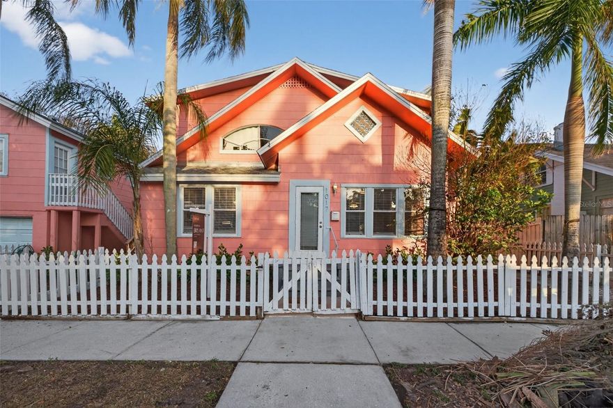 Excellent cash flowing and investment opportunity just 5 minutes from Downtown St. Pete in the popular neighborhood of Uptown. The property offers three total units across two structures: a duplex building with top and bottom units and a detached garage apartment with a 2 bay garage underneath. The duplex building is comprised of two 2 bedroom, 1 bathroom units that have been updated and the bottom unit has its own fenced in front yard. The garage apartment is a studio layout and has its own private balcony off the back of the structure. The property has a full size shared laundry room with extra storage space.  Additional property highlights include the spacious 2 car bay garages for storage or tenant use, driveway parking for 2 cars, and ample off-street parking. The property also has a dolphin mural on the side of the garage structure that fits in with the Uptown charm. Whether you choose to live in one unit and rent the rest or lease all three for maximum returns, this property is primed for strong passive income. Each unit is rented and has professional property management already in place and willing to continue. Located less than 5 minutes from Downtown St. Pete and under 30 minutes to both Downtown Tampa and the Gulf Beaches, this property offers tenants the perfect balance of lifestyle and convenience, ensuring consistent demand and easy leasing.