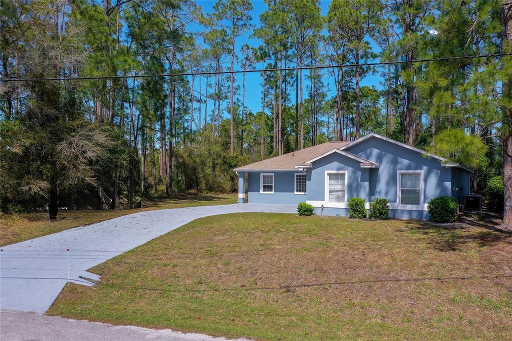Photo of 7 Peninsula Lane, Palm Coast, FL 32164 (MLS # V4947999)