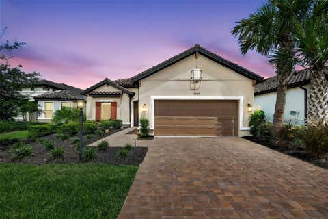 Photo of 10132 Silent Night Lane, Sarasota, FL 34241 (MLS # A4699647)