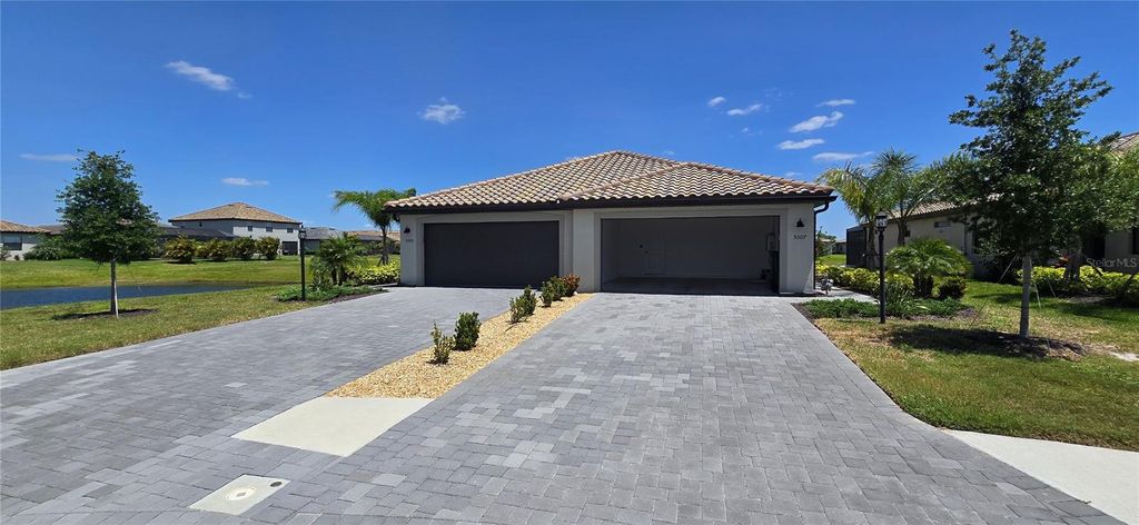 Photo of 5307 Crystal Harbor Cv, Bradenton, FL 34211 (MLS # A4691197)