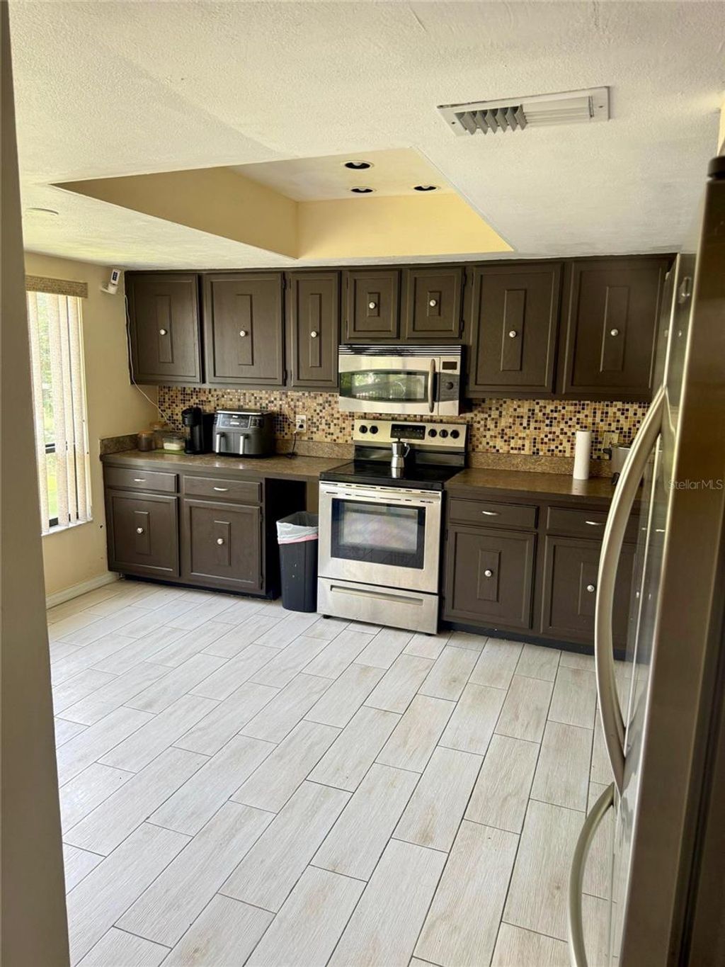 Photo of 4747 Puritan Circle #523, Tampa, FL 33617 (MLS # TB8508341)