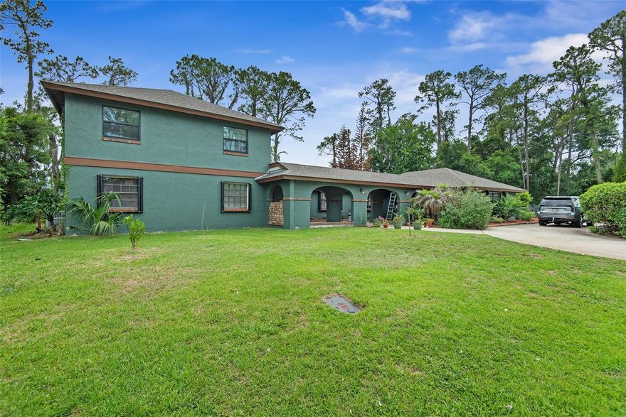 Rare opportunity to own this massive 7-bedroom, 3-bath pool home situated on a triple lot overlooking Hole 9 of the golf course! Offering incredible space and flexibility, this property features a private in-law suite with its own entrance and a first-floor primary suite for added convenience. Step outside to your screened-in pool area, perfect for entertaining or relaxing while enjoying the golf course views.

Major updates have already been completed, including a new roof (2023) and new pool enclosure/screens (2023). Nearly everything else in the home has been updated within the last 5 years, including the remodeled primary bathroom with tile flooring, upstairs bathroom remodel with tile flooring, new second-story flooring and molding, fully remodeled in-law suite with tile flooring, two new AC units and furnace, new air ducts, full stucco repair, rebuilt chimney, fresh exterior and interior paint, two new water heaters, refrigerator, stove, dishwasher, and garage door opener.

With an expansive layout, extensive upgrades, private in-law suite, pool, and golf course frontage, this property offers endless possibilities for multi-generational living, entertaining, or simply enjoying the Florida lifestyle.