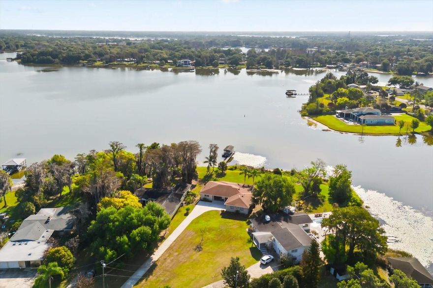 Rare Lakefront Opportunity on Lake Jessamine! 
Welcome to this one-of-a-kind lakefront home nestled on over 1.5 breathtaking acres along the shores of Lake Jessamine! With an impressive 130 feet of water's edge and stunning lake views from throughout the home, this is the Florida waterfront lifestyle you've been dreaming of. 
This warm and inviting 3-bedroom, 2-bath single-family home is drenched in natural light, with gorgeous lake views that greet you the moment you step inside. The open and airy feel of the home makes every day feel like a retreat, whether you're enjoying a quiet morning watching the sunrise over the water or entertaining friends and family in this spectacular setting.
The oversized 2-car garage with a dedicated workshop space is a dream for hobbyists, car enthusiasts, or anyone in need of extra storage and workspace — a rare find that adds tremendous value and versatility to the property. 
Outside, over 1.5 acres of lush lakefront land offer endless possibilities — launch a kayak or paddleboard, cast a fishing line, or simply relax and take in the serene, natural beauty that surrounds you. With NO HOA, privacy and tranquility are truly yours to enjoy. Known updates include: AC (2020), Roof (2015), WH (2016), repipe (2001), and updated electrical panel(s).
Conveniently located in Orlando with easy access to major roadways, shopping, dining, and top-rated amenities — all while feeling like your own private paradise.
Lakefront properties like this don't come along often. Contact me today to schedule your private showing before this gem is gone!