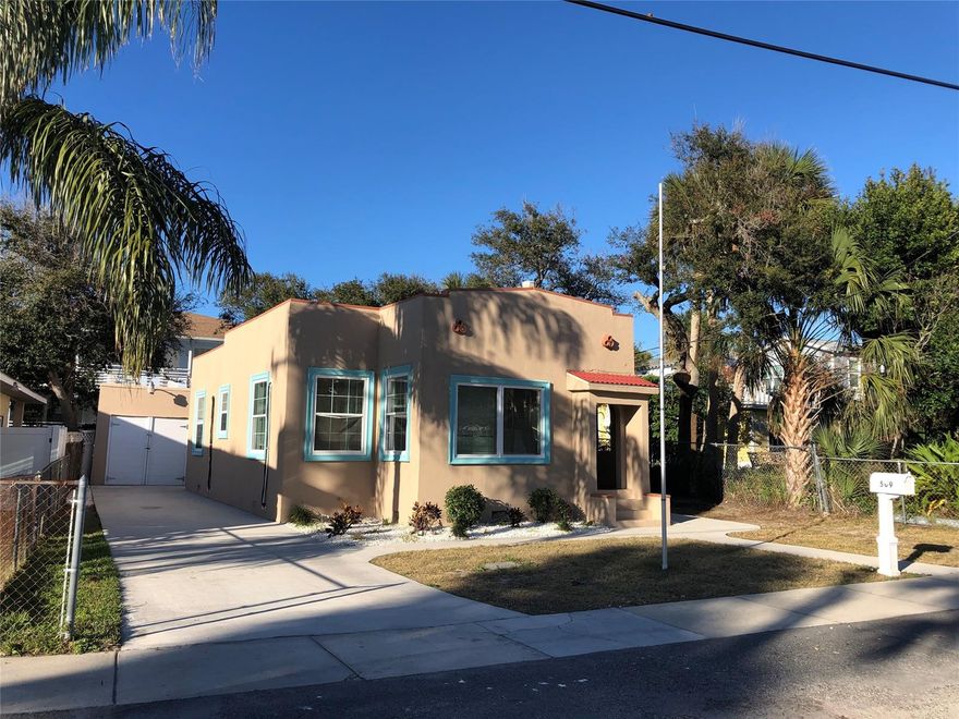 Hear the waves from the beach bungalow only 0.2 miles from the beach access.  Kitchen updated with dark wood cabinetry, tile backsplash and stainless appliances and features a breakfast bar.  Tile throughout kitchen and living area with new carpet in the bedrooms and hallway.  Split A/C system installed Feb 2020.  Fenced backyard, great for entertaining and feature mature tree perfect for trendy backyard lighting.  Single car detached garage offers plenty of storage.  Newer windows throughout, exterior stucco redone and freshly painted. ;Water: City