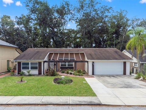 Photo of 8024 Beaver Creek Loop, Hudson, FL 34667 (MLS # W7889930)