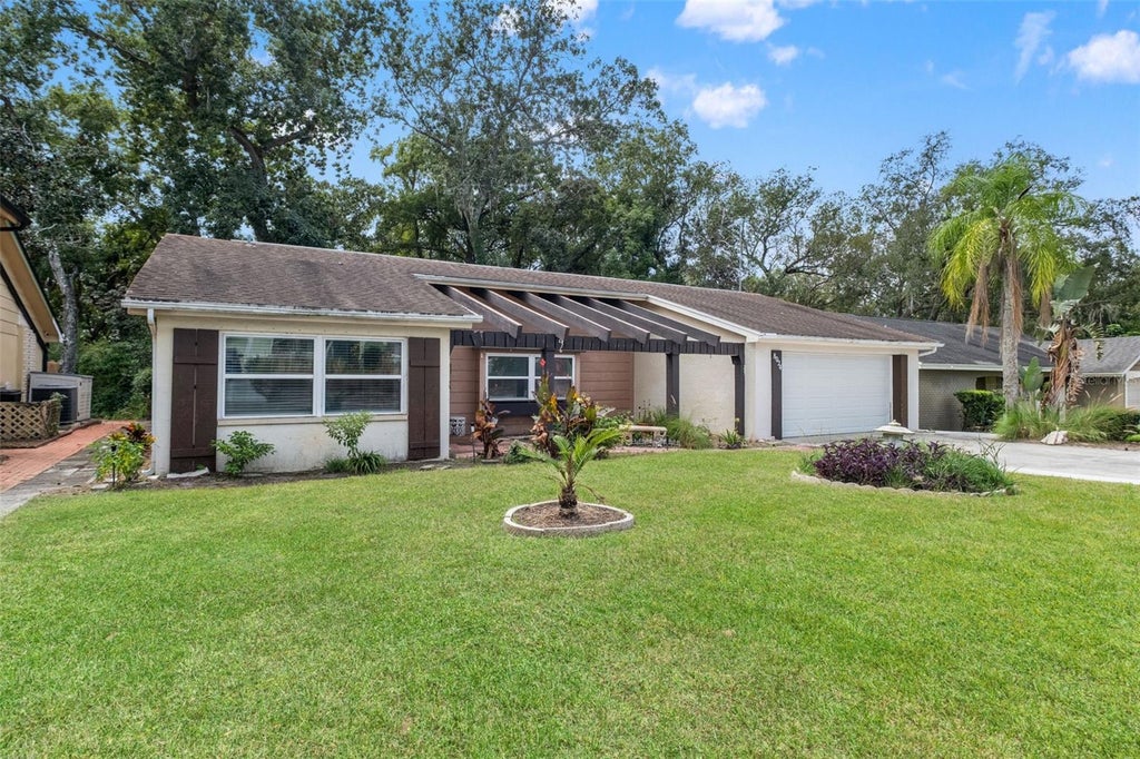 Photo of 8024 Beaver Creek Loop, Hudson, FL 34667 (MLS # W7889930)