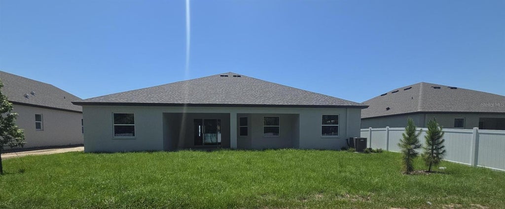 Photo of 12610 Kelly Ann Loop, Brooksville, FL 34613 (MLS # TB8501617)