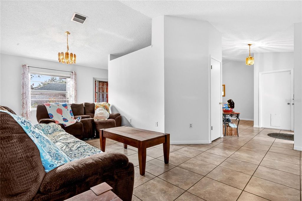 Photo of 10400 Summit Square Drive, Leesburg, FL 34788 (MLS # O6378410)