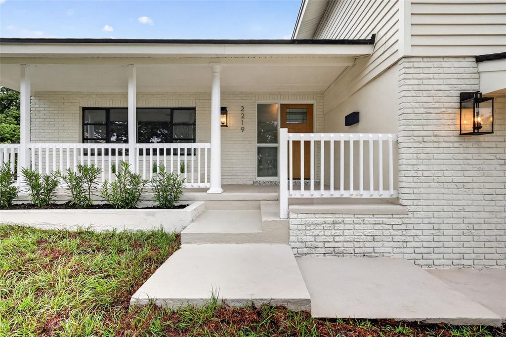 Photo of 2219 Winter Woods Boulevard, Winter Park, FL 32792 (MLS # TB8557964)