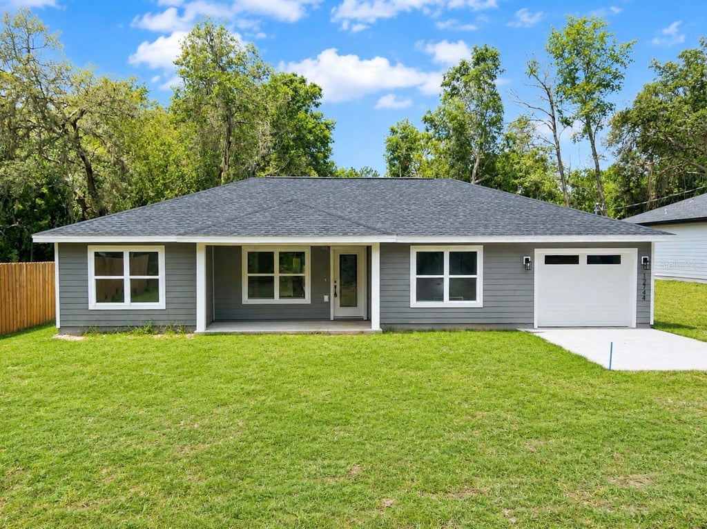 Photo of 12744 SE 102nd Terrace, Belleview, FL 34420 (MLS # OM729494)