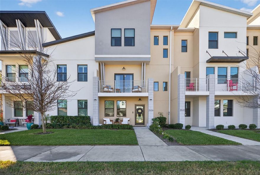 Built in 2023, this beautifully maintained three-story townhome offers over 2,000 square feet of thoughtfully designed living space, just moments from the Grand Central District, Vinoy Park, and the St. Pete Pier.
Located in a gated, resort-style community, the home combines modern design with everyday comfort. Built with concrete block construction and hurricane-rated, impact-resistant windows and doors, this home was designed from the ground up to offer lasting durability and genuine peace of mind.
A charming front porch welcomes you in. The first floor features a flexible den or office space, ideal for working from home or hosting guests, along with a convenient half bath and access to a spacious two-car garage with plenty of storage.
Upstairs, the second-floor living area is bright and open, designed for both relaxing and entertaining. The main living and dining space flow seamlessly into the kitchen, which is equipped with the upgraded Café Platinum Glass Series appliance package — a sleek, elevated touch that makes everyday cooking feel a little more special. A built-in office nook keeps things organized without sacrificing style. This level also features a laundry room upgraded with extra built-in cabinetry for added storage, a half bath for convenience, and direct access to your own private balcony.
On the third floor, you'll find three comfortable bedrooms, including a primary suite complete with an upgraded walk-in closet thoughtfully designed to maximize space, and a beautifully finished en-suite bathroom. A second full bathroom serves the additional bedrooms.
The community offers a true lifestyle experience, with a heated pool, outdoor dining area, fire pit seating, and two large gas grills, perfect for gathering with friends or neighbors. There's also a small dog park and plenty of guest parking.
Your HOA covers water, waste, landscaping, internet, and cable, making day-to-day living that much easier.
All of this is minutes from some of St. Pete's best dining, shopping, and waterfront spots. Whether you're heading out or staying in, this home makes it easy to enjoy both.