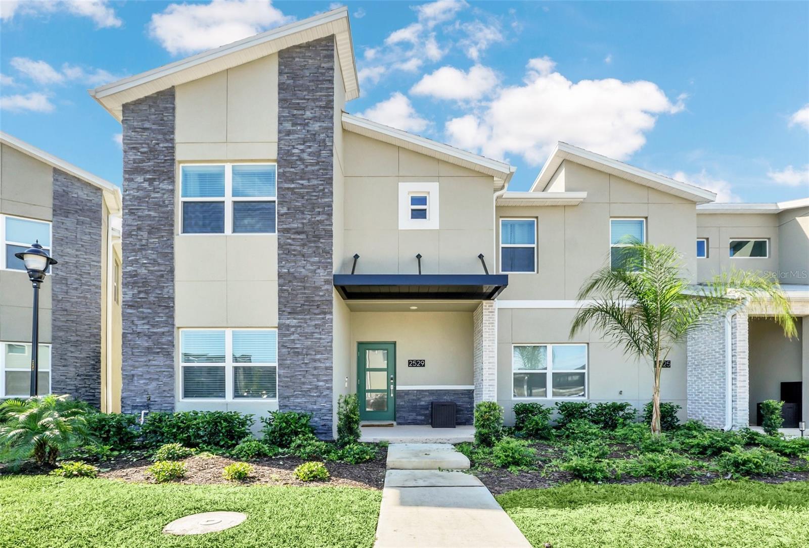 Exquisite 5-Bedroom Corner Townhome in Storey Lake Resort – Fully Furnished & Designer-DecoratedStep into this elegantly curated corner-unit townhome in the highly sought-after Storey Lake Resort, a top-tier vacation and short-term rental community in Kissimmee. With 5 spacious bedrooms, 4 full bathrooms, and a professionally designed interior, this home is truly turnkey—perfectly blending luxury, style, and rental income potential.Why this home stands out:Premium Corner Location: Enjoy enhanced privacy, abundant natural light, and a bright, open-concept floor plan.Modern Gourmet Kitchen: Featuring granite countertops, stainless steel appliances, and a large island designed for entertaining.Private Screened Splash Pool: Seamlessly connected to the living and dining area for the ultimate indoor-outdoor Florida lifestyle.Two En-Suite Bedrooms: Providing flexible accommodations for guests and owners alike.Stylish Themed Bedrooms: Each room is thoughtfully designed to captivate guests and maximize rental appeal.Resort-Style Amenities at Your Doorstep:Enjoy access to Storey Lake’s world-class amenities, including a water park, clubhouse, lazy river, fitness center, tiki bar, and more.Unbeatable Location:Located just minutes from Disney World, Universal Studios, Orlando International Airport, and premier shopping and dining.Whether you’re seeking a high-performing investment property or a luxurious vacation retreat, this residence offers unmatched value, location, and lifestyle.