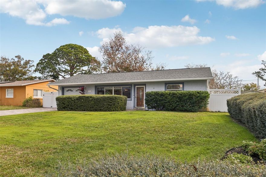 Bursting with charm and impeccable curb appeal, this meticulously maintained 3-bedroom, 2-bathroom gem is tucked away in a serene, sought-after neighborhood in the heart of St. Petersburg, where neighbors actually know each other. The moment you step through the front door, you’ll feel the unmistakable warmth of a place that’s truly "home." The inviting living area shines with brand-new ceramic tile flooring and a large picture window that bathes the space in cheerful, natural light. Culinary enthusiasts will love the kitchen, which boasts sleek new appliances, custom full-height wood cabinetry, and an abundance of storage. Both bathrooms have been fully transformed with modern, elegant tile finishes, while the primary suite offers a private retreat complete with generous closet space and clever custom built-ins. At the rear of the home, a cozy den serves as your gateway to a backyard paradise. Rest assured, the HVAC was brand new in 2024 for your peace of mind. Step out onto the patio to discover a lush, fully fenced oasis framed by mature landscaping and majestic shade trees—the perfect backdrop for weekend BBQs or quiet morning coffee. Professional upgrades abound, including a stylish brick-paver driveway and back patio, plus a one-car garage with ample storage (and yes, the washer and dryer are included!). You’ll be perfectly positioned to enjoy the best of the active Gulf Coast lifestyle, with Tyrone Square Mall, the JW Cate Recreation Center, public pools, tennis courts, and world-class beaches just minutes away. Don’t miss your chance to own this St. Pete standout—schedule your private tour today! High and Dry from all recent storms, no damage or flooding - low insurance premium can be transferred to new owners!