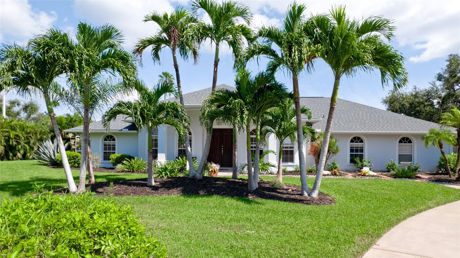 One or more photo(s) has been virtually staged. Welcome to this beautifully maintained custom-built Remco home in the highly desirable Palma Sola neighborhood of West Bradenton—just 3 miles from the stunning beaches of Anna Maria Island! Enjoy being minutes from Robinson Preserve, De Soto National Memorial, Palma Sola Bay, and the Manatee River. This spacious 3BR/2BA + home office residence offers a formal dining area, a chef’s kitchen with ample cabinetry, upgraded appliances including a Jenn-Air True Convection downdraft range, and a cozy eat-in kitchen that opens to the family room. The light-filled great room features sliding glass doors that lead to a private screened lanai and a sparkling in-ground pool—perfect for entertaining. The oversized primary suite features a garden tub, a walk-in tiled shower, and a large walk-in closet. Additional features include an indoor laundry room, a built-in pantry, and a 2-car garage with space for a golf cart. New Roof 2024; water heater 2023. Set on approximately 1/3 acre with mature tropical landscaping. Conveniently located just 10 mins to downtown Bradenton, 25 mins to Sarasota & UTC, and close to two major hospitals. Woods of Palma Sola is a small, deed-restricted community comprising 71 homes located in northwest Bradenton, FL. If you are active or adventurous and enjoy all that Florida is about, then you will love this community. Just across the Manatee Avenue causeway are the stunning Gulf beaches offering perfect sunsets, music, restaurants, fishing, and crafts. If trail walking and kayaking are your thing, you will be happy to know beautiful Robinson Preserve and DeSoto National Memorial Park are only a short drive away. There are also several public boat launches: Warner's Bayou, Palma Sola Causeway, and Kingfish Landing. This home will not be on the market long. Come see us now before someone else claiims the address!!