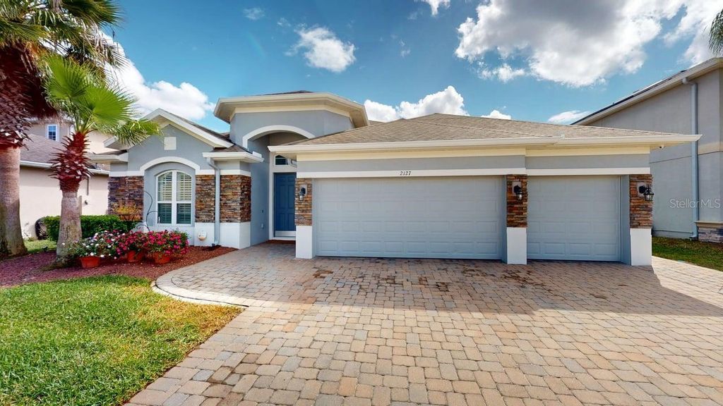 Photo of 2127 Plantation Oak Drive, Orlando, FL 32824 (MLS # O6388352)