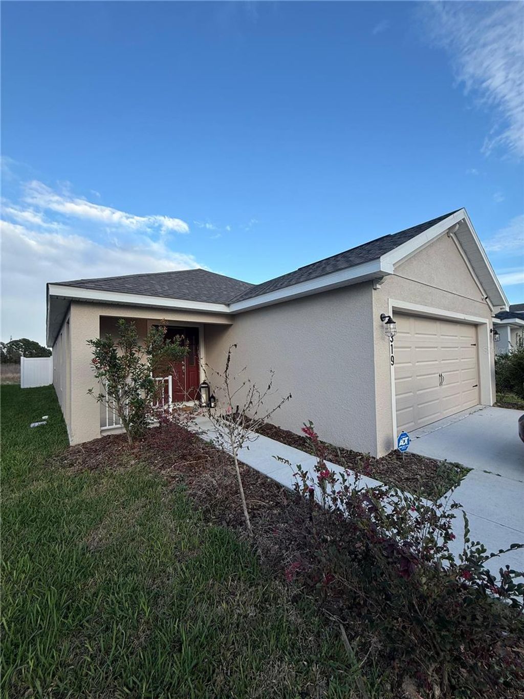 Photo of 319 Lily Lane, Davenport, FL 33837 (MLS # O6390958)