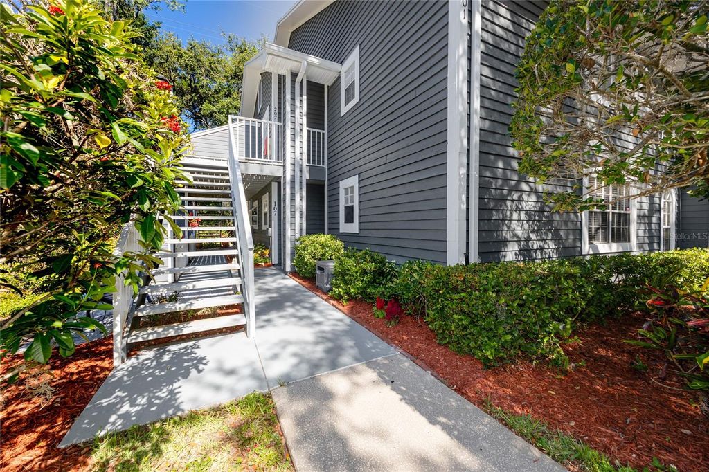 Photo of 2101 Fox Chase Boulevard #107, Palm Harbor, FL 34683 (MLS # TB8506920)