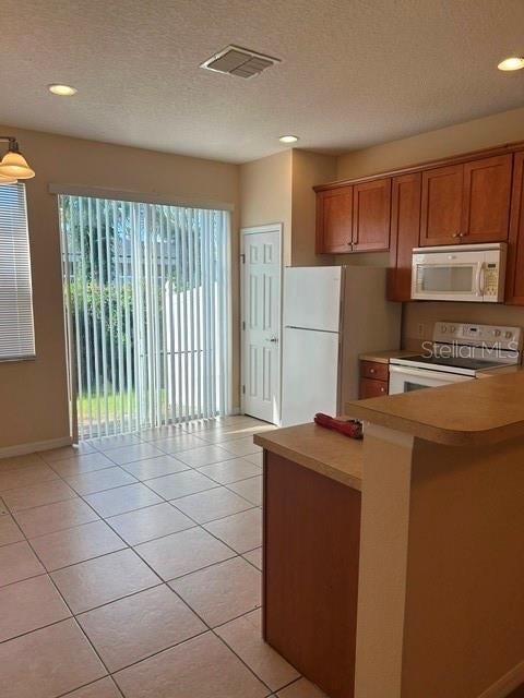 Photo of 5322 Paradise Cay Circle, Kissimmee, FL 34746 (MLS # O6441138)
