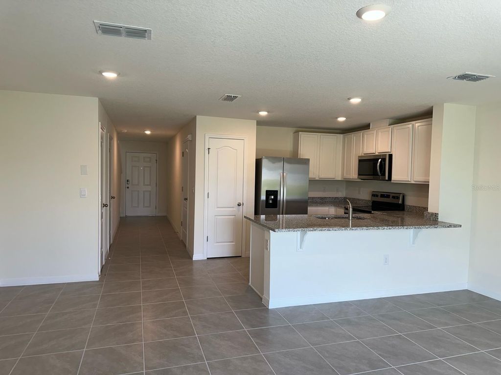 Photo of 2923 Brie Hammock Bend, Saint Cloud, FL 34773 (MLS # O6402464)