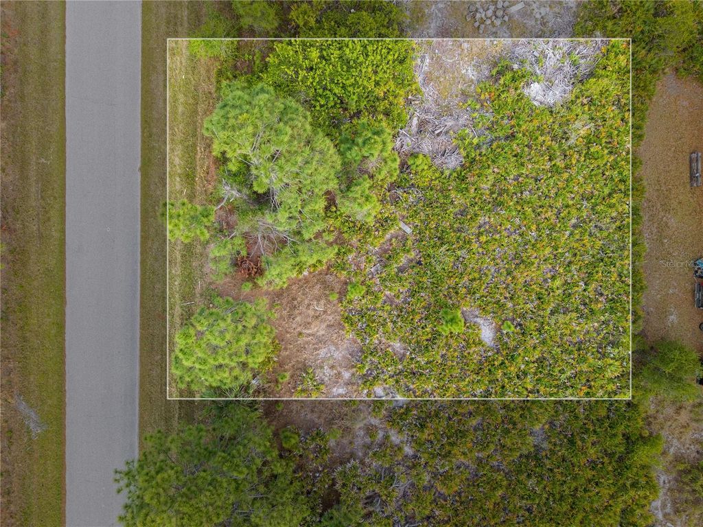 Photo of 12161 Diversey Avenue, Port Charlotte, FL 33981 (MLS # O6292646)