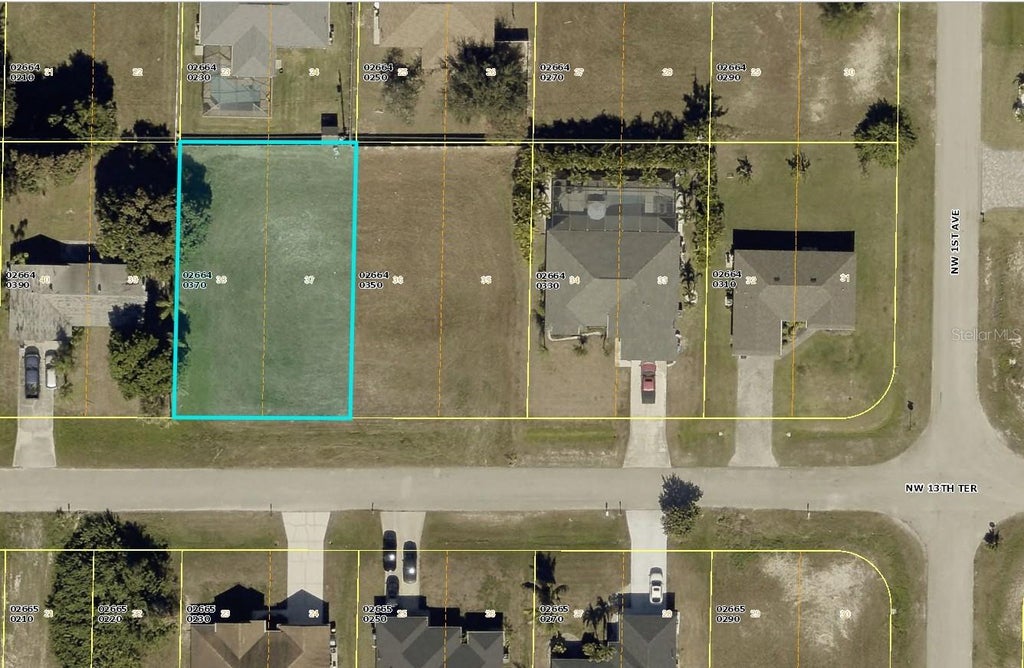 Photo of 115 NW 13th Terrace, Cape Coral, FL 33993 (MLS # C7530415)