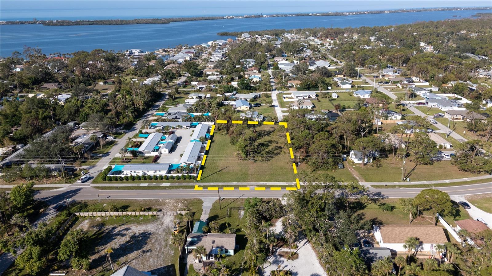 Prime Oversized Parcel in the Heart of Englewood!
This expansive, cleared property is just minutes from Englewood’s beautiful beaches, shopping, restaurants, and more! Confirmed buildable by the county, this rare find offers incredible potential. With public water and sewer available, the possibilities are endless—build your dream home, create a family retreat, or take advantage of the opportunity to subdivide into two, possibly three residential parcels for development or investment. Don't miss out on this unique chance to own a versatile piece of Englewood real estate!