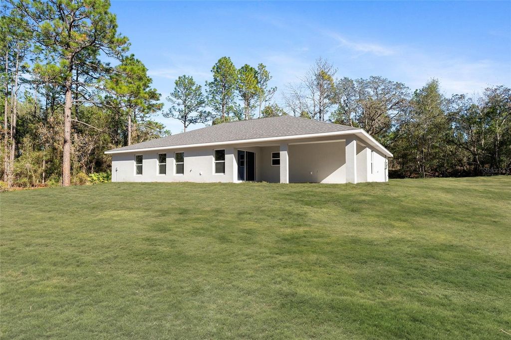 Photo of 9110 SW 129th Terrace Road, Dunnellon, FL 34432 (MLS # OM714899)