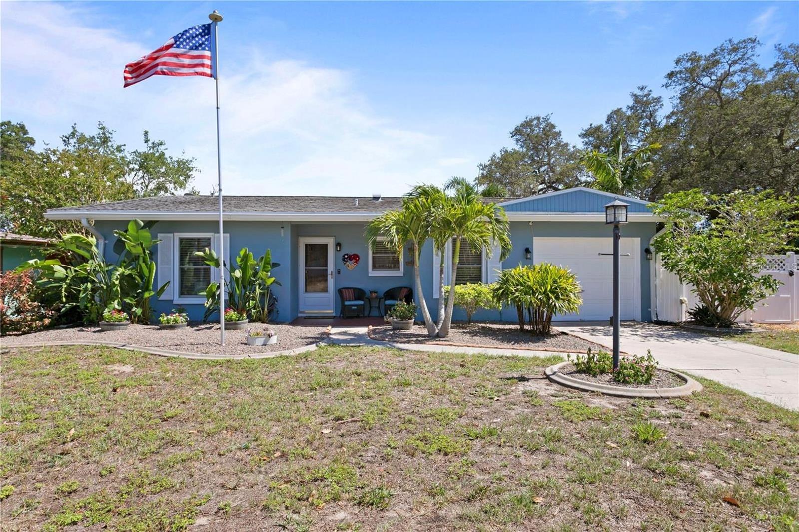 Welcome to Your own OASIS IN THE SUN boasting lots of POOL tranquility and privacy, behind your fence. Fabulous 3 bedroom, 2 bath ranch style home situated on a beautiful DOUBLE LOT in the waterfront community of Baywood Village. Home can be partially furnished and home gym equipment can stay as well. The kitchen has stainless steel appliances, solid wood cabinets and granite counter tops. Refinished terrazzo flooring and neutral paint throughout house. Both bathrooms have been modernized with the addition of updated plumbing fixtures, granite counter tops, walk-in shower in master ensuite. Outside landscape has a variety of trees planted by the owner, 3 out buildings, vinyl 6 foot privacy fence surrounds this property and updated exterior paint. This double lot shows off the gorgeous pool surrounded by brick pavers offering perfect space for those backyard gatherings and a cozy fire-pit. This home is located within walking distance to the Pinellas County Trail and minutes from local parks, beaches both Dunedin and Tarpon along with the famous Sponge Docks. Rent Special! No Application Fee to apply for this property. Minimum qualifications include verifiable gross monthly income of at least 3 times the monthly rent amount, a credit score of 600 or higher, and stable rental history. No evictions or landlord collections.