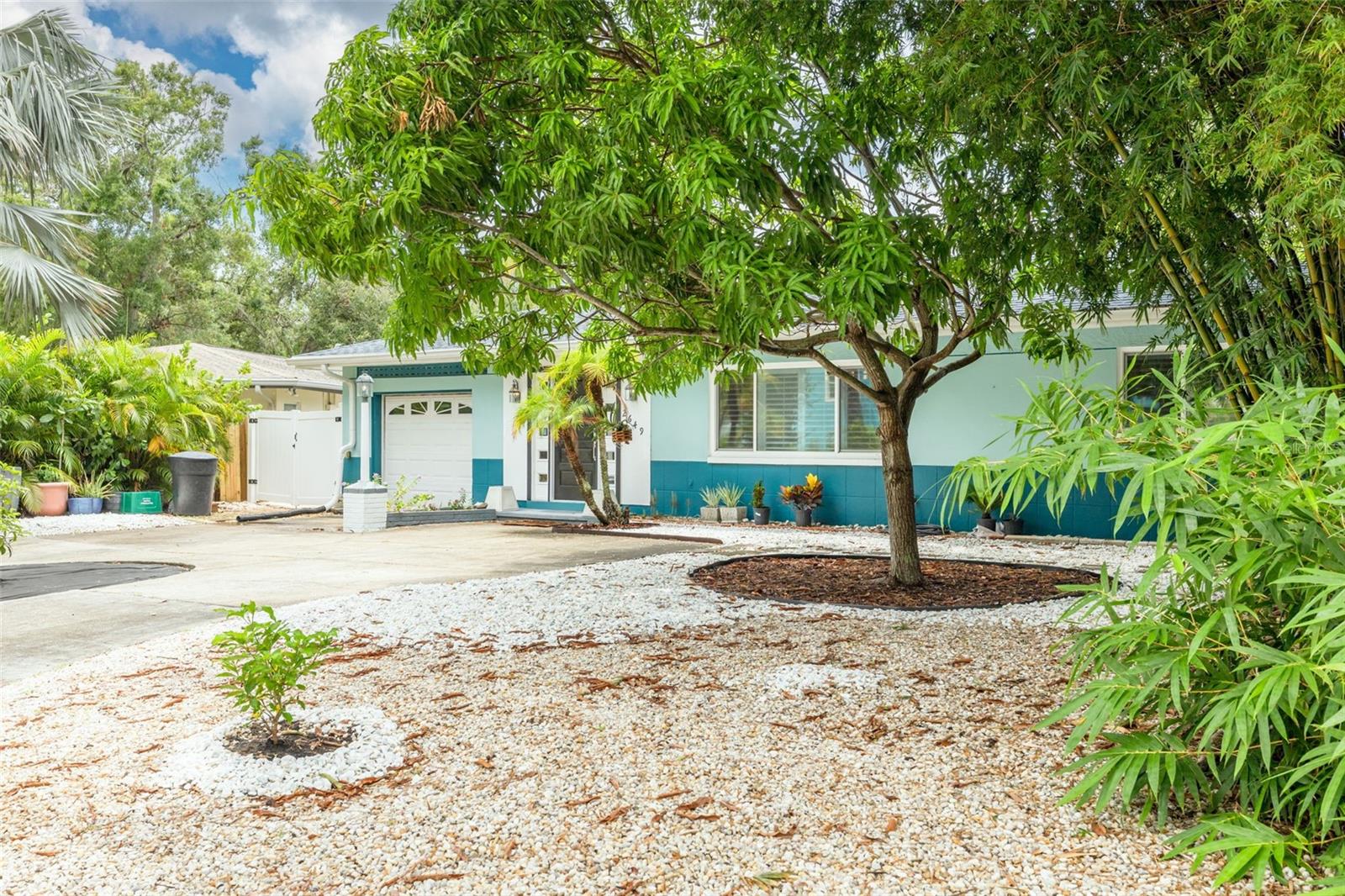 This Gulfport gem is what you've been looking for! Welcome to 2649 Tifton St S, a beautifully updated 2-bedroom, 2-bath home offering 1,472 square feet of thoughtfully designed living space, complete with a versatile bonus room ideal for an office. This home blends modern comfort with timeless charm and is packed with features that set it apart. Step through the front door into a warm and welcoming entryway, where you'll immediately notice the home’s inviting atmosphere. A convenient coat closet is located just to your left, providing a perfect drop zone for guests and daily use. From the entry, you're greeted with a well-designed split floor plan that offers flexibility and flow—head straight ahead into the main living areas, including the dinette, kitchen, living room, and office, or turn right toward the formal dining room and the two spacious bedrooms. Inside, the kitchen is a chef’s dream, featuring white soft-close cabinetry, a beautiful backsplash, recessed lighting, quartz countertops, and a wine bar. Stainless steel appliances and an open-concept layout make this space both highly functional and perfect for entertaining. The spacious living room offers plenty of room for gatherings and includes a bar that opens into the kitchen, creating an inviting flow ideal for hosting. Natural light fills the home through ample windows, giving the space a warm and airy feel. Additional interior highlights include plantation-style shutters, motorized blinds, and a variety of new, updated lights and fixtures that bring a modern touch to every room. The horseshoe driveway provides convenient extra parking and enhances the home’s curb appeal. Step outside into the oversized, fenced-in backyard, a perfect extension of your living space. The paver patio is prewired for a hot tub, allowing you to create a private outdoor retreat. Whether you're entertaining guests, enjoying a quiet evening, or letting pets roam freely, this backyard offers endless possibilities. Living in Gulfport means enjoying a vibrant, outdoor-focused lifestyle. You're just moments away from the Gulfport Municipal Marina, where you can rent a kayak or take a scenic boat tour of Boca Ciega Bay. Clam Bayou Nature Preserve offers peaceful trails ideal for hiking and dog-walking, while Gulfport Beach and Tomlinson Park provide great spots for relaxing, fishing, or using the outdoor fitness equipment. The nearby Gulfport Recreation Center features amenities like a playground and skate park, making it a great community space for all ages. Education is also within easy reach, with St. Petersburg College, Eckerd College, Pinellas Technical College, and Stetson University College of Law all located within three miles of the home. This makes it an ideal location for anyone seeking proximity to top-tier schools. For those who love culture and community, Gulfport delivers in every way. Take a walk along Beach and Shore Boulevards, lined with art galleries, local shops, and cafes. Enjoy live music at the Art Village Courtyard or explore local history at the Gulfport Historical Society. The neighborhood offers an eclectic mix of dining and entertainment, including waterfront restaurants, the historic Gulfport Casino, and the ever-popular Gulfport Tuesday Fresh Market. This property combines modern updates, bright and open living spaces, and a prime location in one of Gulfport’s most desirable neighborhoods. Schedule your private showing today!